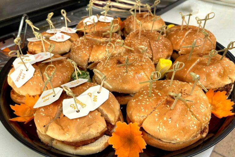 burgers on a black tray