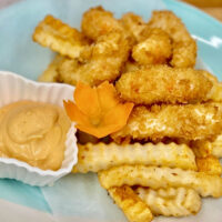 fried vegan shrimp and fries on a plate