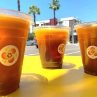cups of thai tea on a table