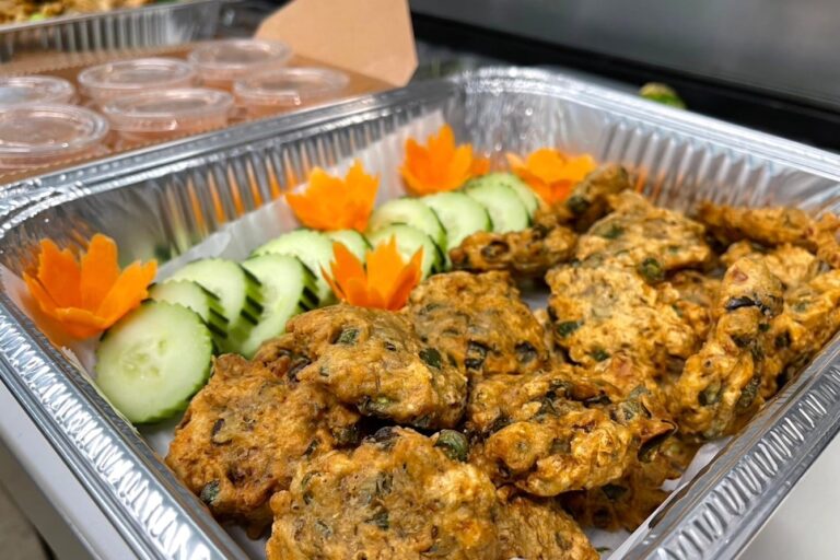 round vegetable patties in an aluminum tray