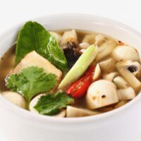 tom yum mushroom soup in a bowl